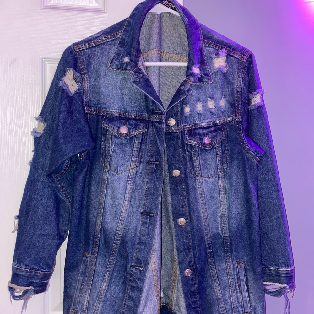 Fashion nova jean jacket with rips